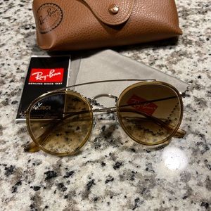Ray-ban rounded sunglasses.